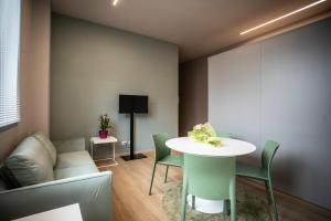 TV a/nebo společenská místnost v ubytování Hotel Delta