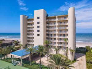 a view of a hotel with the ocean in the background at Penthouse Condo with wrap around views of the ocean - SR802 in Edgewater