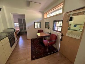 A kitchen or kitchenette at Piburg Seebichlhof