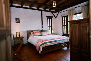 Una cama o camas en una habitación de Eucaliptus Spa Resort