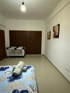 Postel nebo postele na pokoji v ubytování complexe al massira imm 13 n 6 etg 2