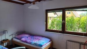 Postel nebo postele na pokoji v ubytování Ferienhaus mit Meerblick