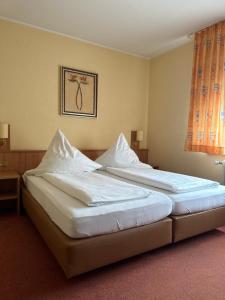 Postel nebo postele na pokoji v ubytování Haus Berrenrath