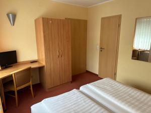 Postel nebo postele na pokoji v ubytování Haus Berrenrath