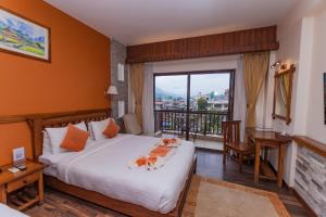 Katil atau katil-katil dalam bilik di Pokhara Batika