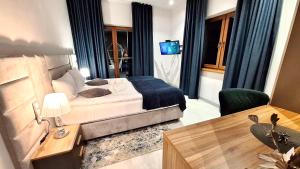 ELFF -Apartamenty i pokoje gościnne客房内的一张或多张床位