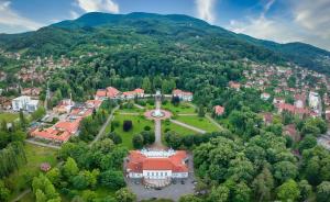 an aerial view of a town in the mountains at Apartman Nana in Banja Koviljača