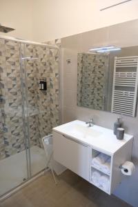 Koupelna v ubytování Salerno Rooms + 24 fotografií