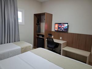 TV a/nebo společenská místnost v ubytování Hotel Gamboa Premium Macau