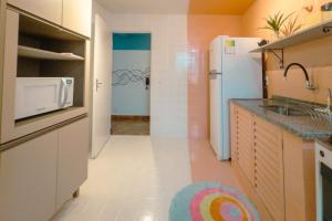 Kuchyň nebo kuchyňský kout v ubytování Apto Centro 3 QTS Ar Sensacional! MC51