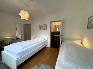 Postel nebo postele na pokoji v ubytování Hafenbad - großes Cityapartment