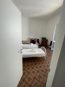 Postel nebo postele na pokoji v ubytování Cavour 414 + 5 fotografií