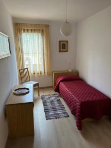Postel nebo postele na pokoji v ubytování Appartamento Medán