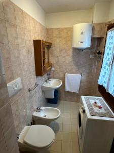 Koupelna v ubytování Appartamento Medán + 10 fotografií