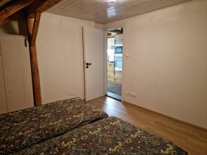 Postel nebo postele na pokoji v ubytování Apartmány Šafran Štrba