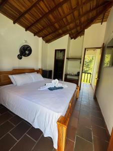 Katil atau katil-katil dalam bilik di Hotel Hacienda Guane Campestre