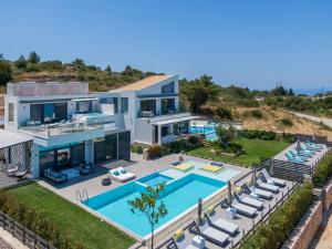 an aerial view of a villa with a swimming pool at Eliandreia Luxury Villas in Kalamitsi