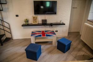 TV a/nebo společenská místnost v ubytování Il Borgo sul Lago di Como