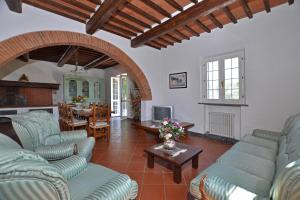 A seating area at Tenuta Santa Colomba - Happy Rentals