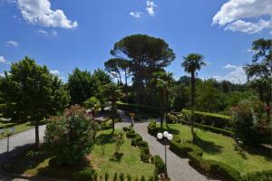 A garden outside Tenuta Santa Colomba - Happy Rentals
