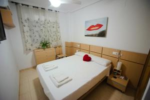 Postel nebo postele na pokoji v ubytování Apartalux Magic Gold