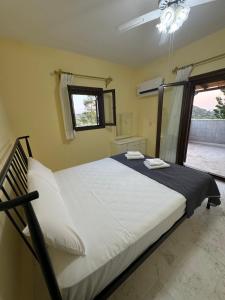 Letto o letti in una camera di Mani Spot in Almiro