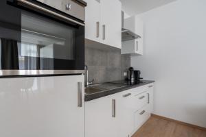 Kuchyň nebo kuchyňský kout v ubytování FarawayHomes Studio Fohnsdorf #A1