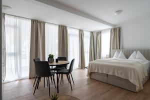 Postel nebo postele na pokoji v ubytování FarawayHomes Studio Fohnsdorf #A1