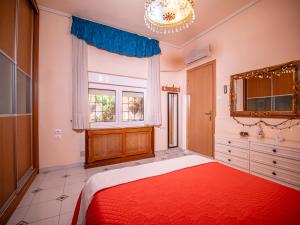 Postel nebo postele na pokoji v ubytování Vasiliki's cottage - Alykes Volos