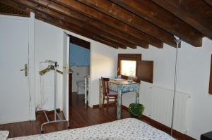 A bed or beds in a room at Arco Ubriaco