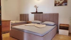 Cama o camas de una habitación en Hotel Laura