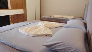 Cama o camas de una habitación en Hotel Laura