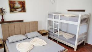 Cama o camas de una habitación en Hotel Laura