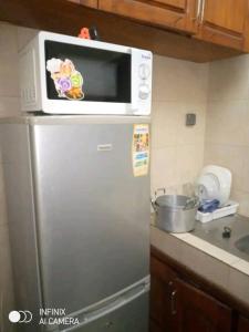 ครัวหรือมุมครัวของ Résidence Studio meublée +2 ภาพ