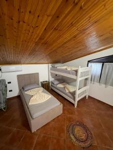 Postel nebo postele na pokoji v ubytování Hotel Laura