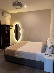 Postel nebo postele na pokoji v ubytování Aura Hotel B&B