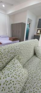 Postel nebo postele na pokoji v ubytování Estudio Flamboyan + 2 fotografie