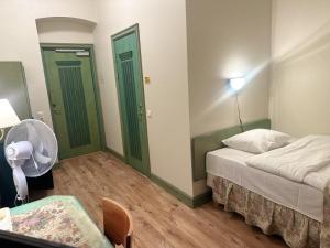 Postel nebo postele na pokoji v ubytování Centrum Hostel