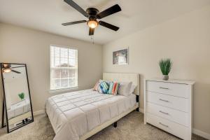 a bedroom with a bed and a ceiling fan at San Antonio Home with Fenced-In Yard Steps to Park! in San Antonio