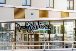 Sertifikat, nagrada, logo ili drugi dokument prikazan u objektu Radisson Hotel Graz