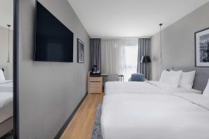Krevet ili kreveti u jedinici u okviru objekta Radisson Hotel Graz