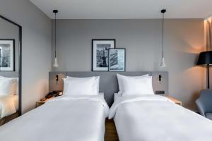Krevet ili kreveti u jedinici u okviru objekta Radisson Hotel Graz
