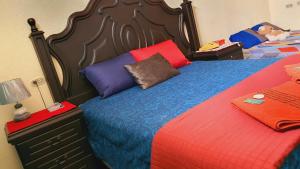 Postel nebo postele na pokoji v ubytování Kasita Feliz