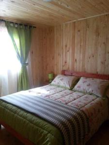 Postel nebo postele na pokoji v ubytování Cabañas Soelafquen