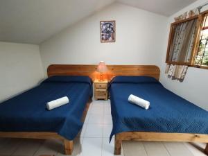 Postel nebo postele na pokoji v ubytování Hotel Miramar