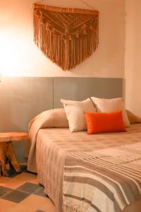 Ένα ή περισσότερα κρεβάτια σε δωμάτιο στο Mascomunal hostel