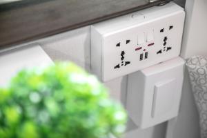 a close up of a white electrical socket at Studio41 in Seoul