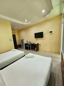 TV a/nebo společenská místnost v ubytování Samran Resort