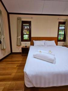 Postel nebo postele na pokoji v ubytování Samran Resort + 37 fotografií