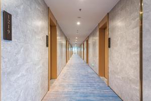Gambar di galeri bagi Poltton International Apartment - Guangzhou Knowledge City Wangcun Subway Station di Jiufo